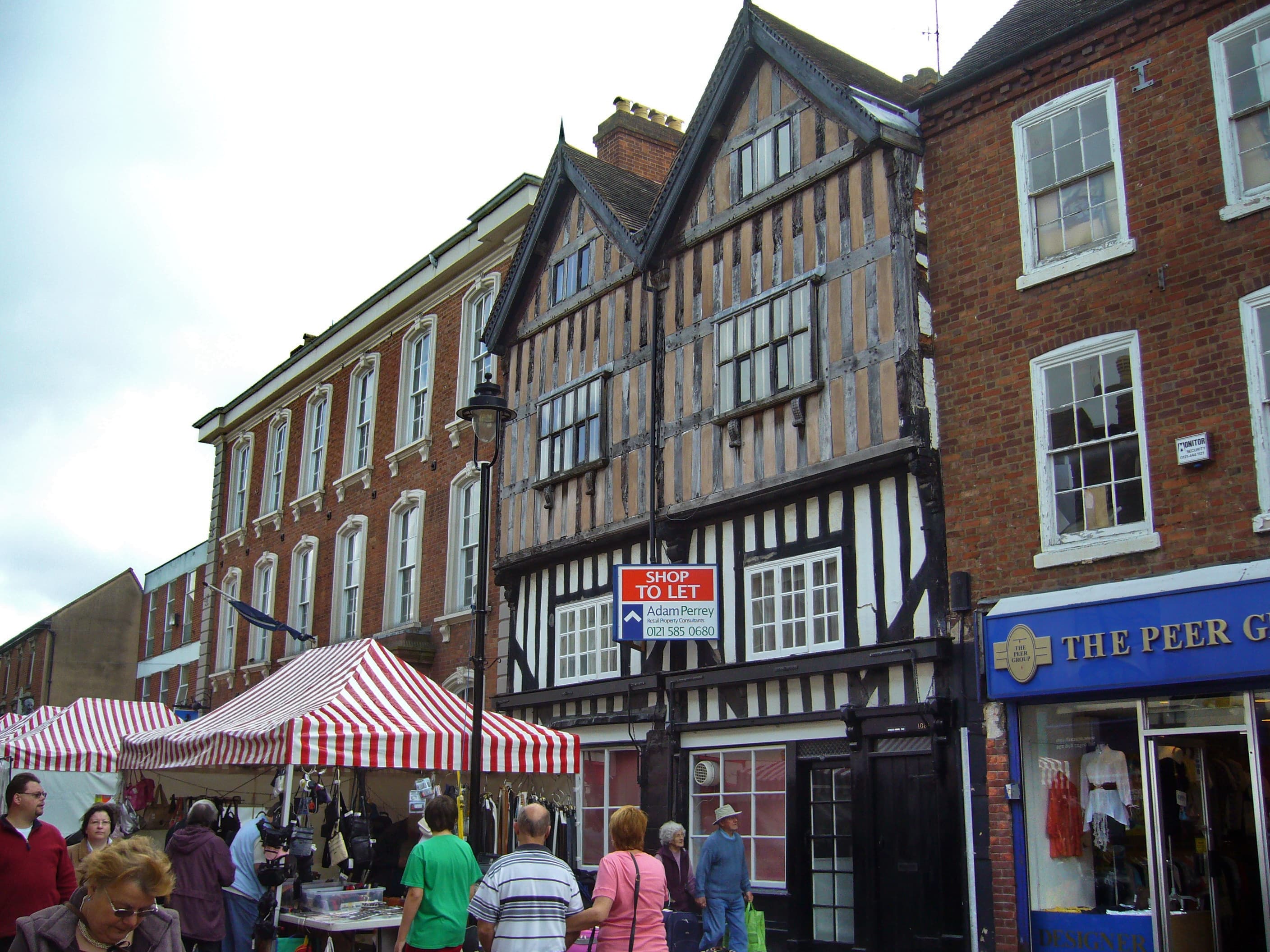 Historic timber-framed buildings and market stalls on Bromsgrove High Street